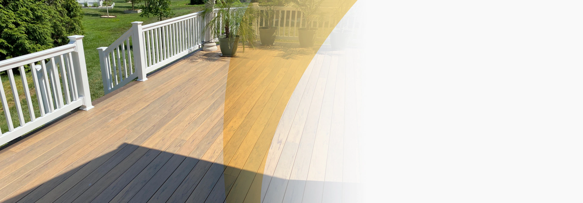 wooden deck with white rails